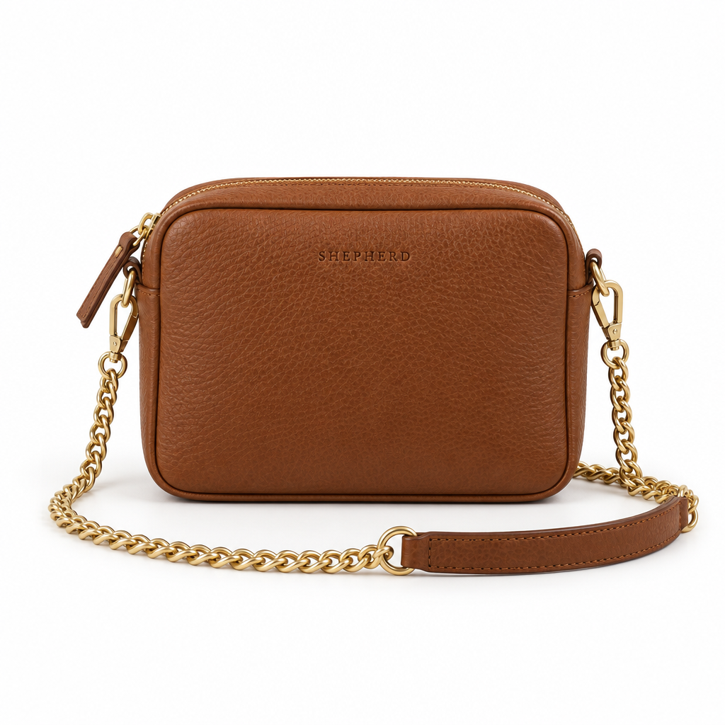 Shepherd Chain Crossbody Bag in cognac brown leather with gold chain strap